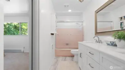 Smart design! The primary bedroom's continental bathroom provides the flexibility of a private ensuite and a shared bathroom via the hallway.