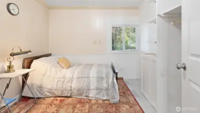 More flexible living space downstairs! This is the other bonus room, also set up as a bedroom, offering even more room to spread out.