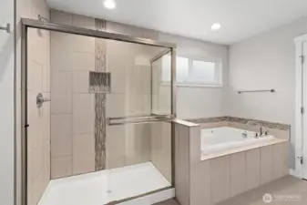Primary titled shower and soaking tub!