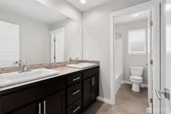 Second floor, main bath, conveniently located across the hall from guest bedrooms, next the laundry/linen room.
