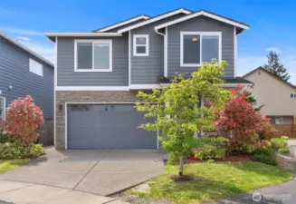 Beautifully landscaped and well maintained front entry to your new home at Montrose of Lake Serene!