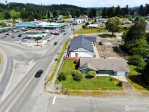 Aerial view showing full service grocery store and gas station just across the street!