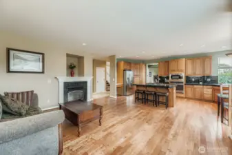 RELAXING FAMILY ROOM, WITH GAS FIREPLACE, OPEN FLOOR PLAN TO KITCHEN.
