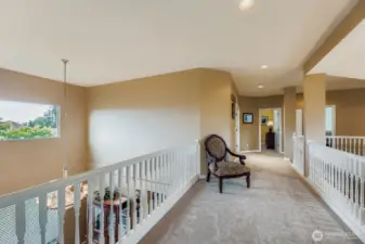 CHARMING SKY-BRIDGE HALLWAY FROM PRIMARY BEDROOM. PROVIDES PEACEFUL ELEGANCE.