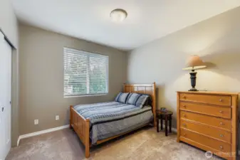 PLEASANT THIRD BEDROOM UPSTAIRS IS COMFY AND RELAXING.