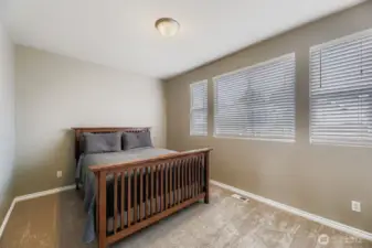 COZY FOURTH BEDROOM UPSTAIRS IS ENJOYABLE AND QUIET.