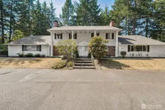 Building is private and secluded off of 97th.  There are 4 homes to each building.  Home is on the right, one level end unit.