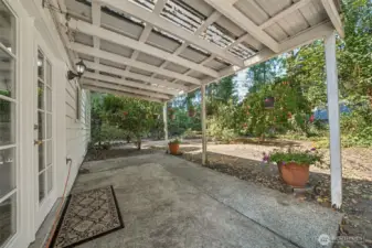 Covered patio and yard.