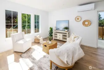 Step into this brightly lit, comfortable and private living room.