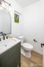 Main floor powder room keeps guests off of the two top floor ensuites.