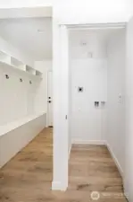 Main floor washer and dryer hook up designed for full size stackable units.