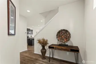 Elegant entry show casing cathedral ceilings