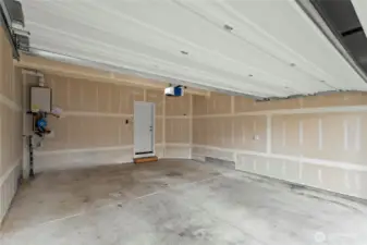 Spacious two car garage & location of tankless water heater
