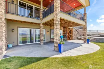Lower and main level stamped concrete back patios
