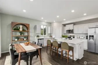 Kitchen with nook space. Finishes and options will vary.