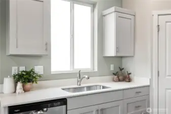 Enjoy the natural light in the kitchen. Finishes and options will vary.