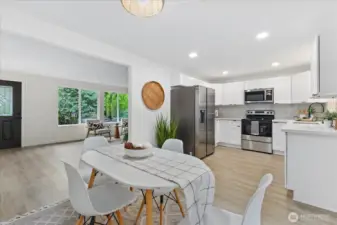 All new stainless steel appliances, quarts counters and tile backsplash.