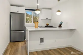 Kitchen is where we spend a lot of daytime and this is one has it all: bar are, quartz waterfall countertops, new SS appliances, freshly painted cabinet doors and plenty of light, not to mention modern fixtures.