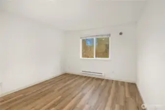 Bedroom on the north side for peaceful nights that overlooks greenery on the back of the complex. LVP flooring throughout. Allergy friendly.
