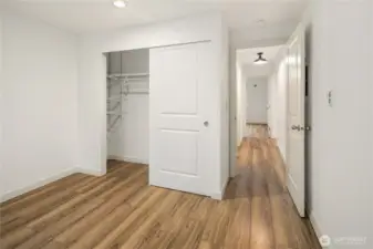 Bedroom #2 (south oriented) with its own closet and shelving inside.
