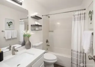 A full bath off the second primary bedroom, also fully updated!