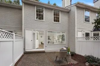 A large patio offers space to relax or grill. Storage closet and garden space to nurture your green thumb!