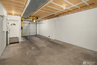Oversized 2 car tandem garage with storage space
