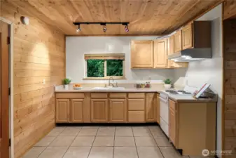 Nicely updated kitchen offers plenty of cabinets and counterspace for your cooking needs.