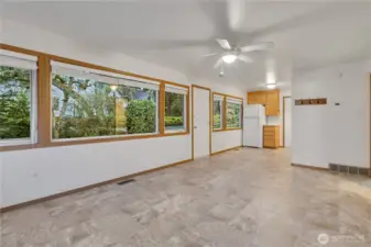 Unit D... main living room with lots of windows letting in tons of natural light!