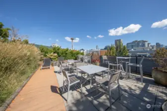 Rooftop deck with expansive views of Elliot Bay, the Space Needle and downtown Seattle.
