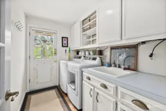 Laundry room/mud room with sink and storage