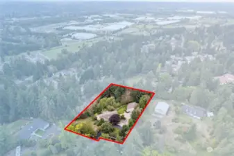 1.68 acres of privacy in Edgewood!