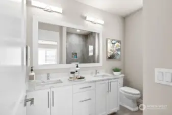 Virtual staging. Primary bathroom with thick slab quartz countertops, double undermount sinks, and a large fully tiled shower.