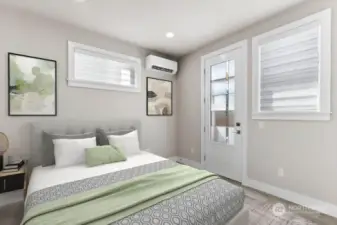 Virtual staging. Lower level bedroom / office has it's own entry door, mini-split for heating/cooling, a large walk-in closet, and own 3/4 bathroom!