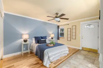 Primary bedroom with access to backyard.
