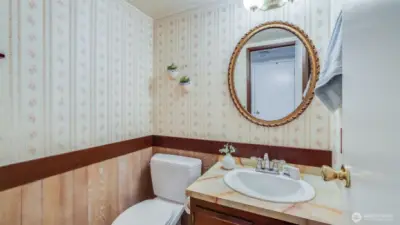 Convenient half bath on the main floor.