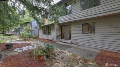 Serene backyard creates a great space for indoor/outdoor living all summer long.