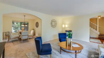 Dining room seamlessly connects to the formal living room, ideal for entertaining.