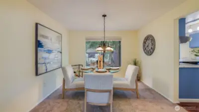 The spacious dining room is just step from the kitchen perfect for easy serving.
