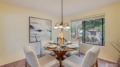 Enjoy views to the garden setting in the backyard from this dining room.