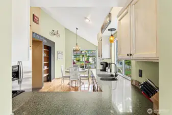 This shot was taken from the "pass-through window" from the more formal dining area.  What a great way to pass food and dishes through to the larger dining table !