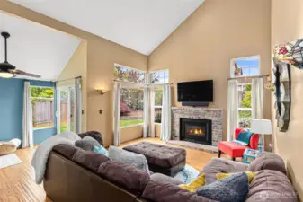 This open floor plan is a serious win! Dining area on the left, door to backyard, gas fireplace & room for large furniture.