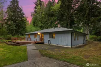 Generator cover built on to right of house as pictured, attached to home.