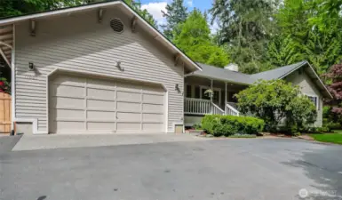 Plenty of onsite paved parking as well as the garage