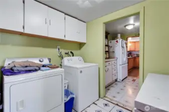 utility room with cabinets in the ADU