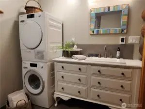 Guest Bath with laundry, radiant floor heat.