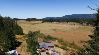 A birds eye view looking northeast and across the agricultural east side of Crow Valley. Mount Constitution as back drop.