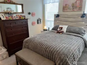 Another view of the primary bedroom.