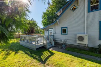 The second part of the deck.  Door enters to laundry room, then into the kitchen.
