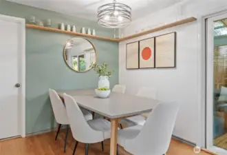 Dining space conveniently located off kitchen with easy access to cover deck with large entertainment space.